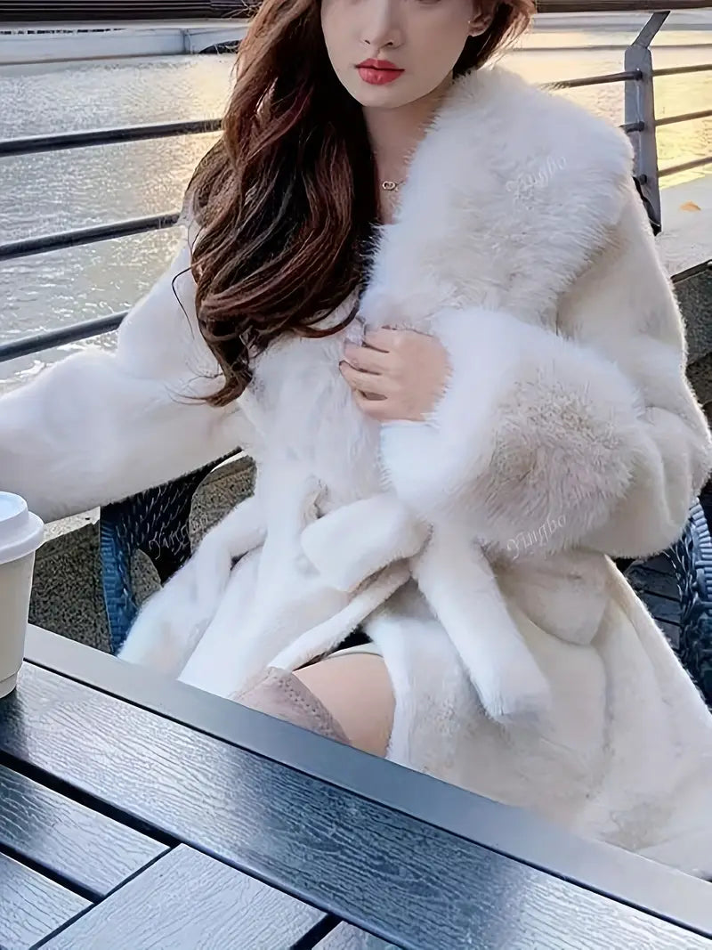 معطف "الرفاهية النقية": لمسة ناعمة تحاكي السحاب لتألق شتوي فاخر